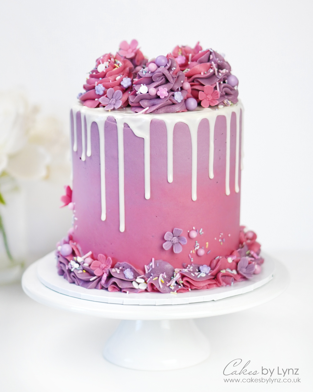 Pink and purple two tone buttercream drip cake