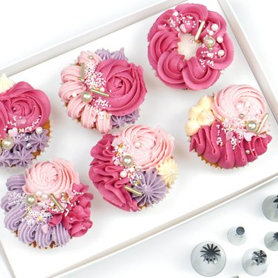 Box of piped cupcakes - Cupcake piping techniques tutorial